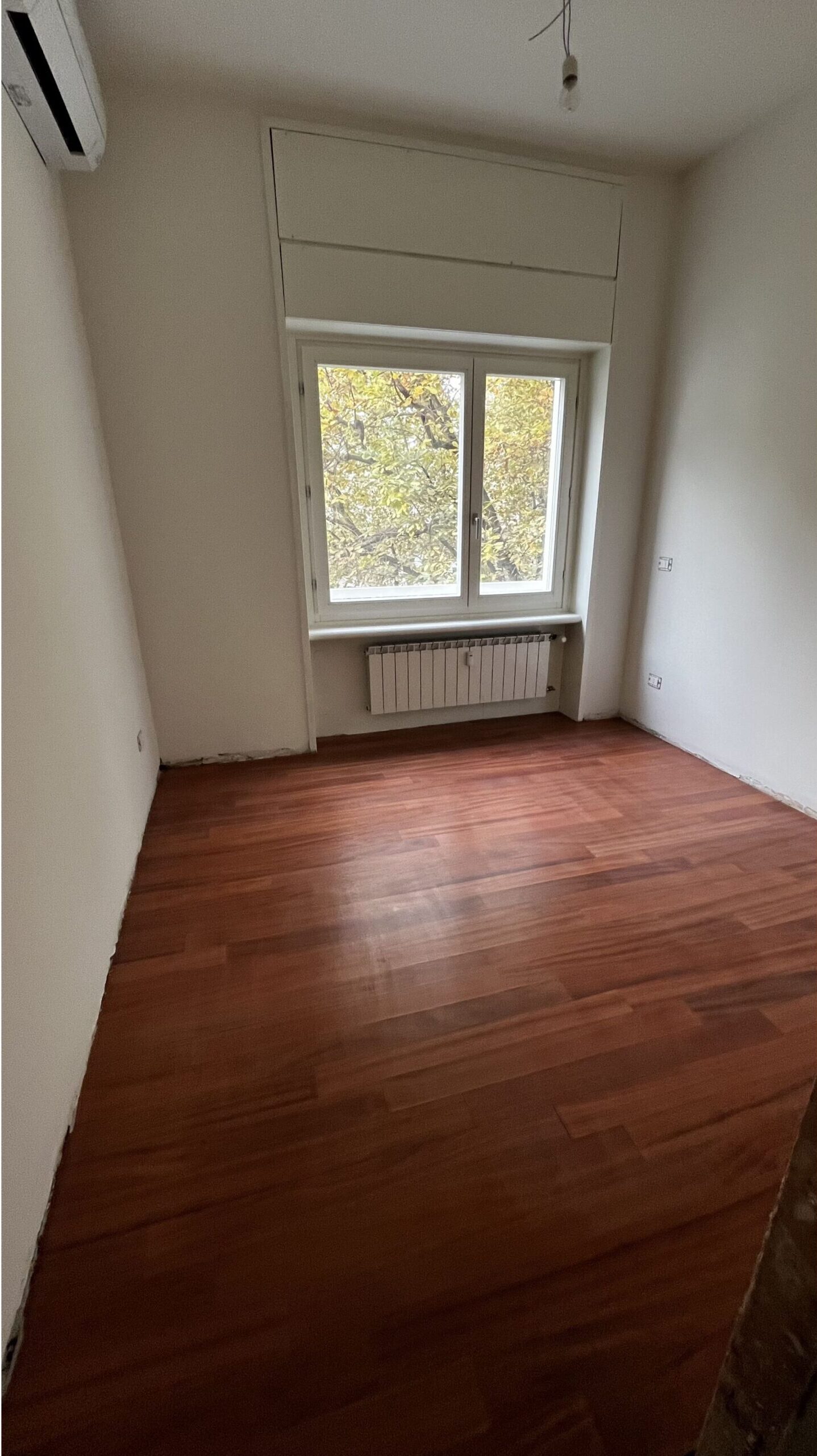 Lamatura parquet, rasatura pareti e posa serramenti